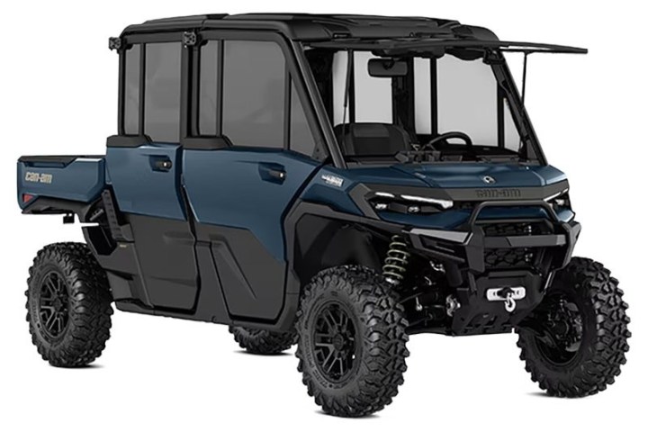 Blue off-road vehicle with four doors and large tires.