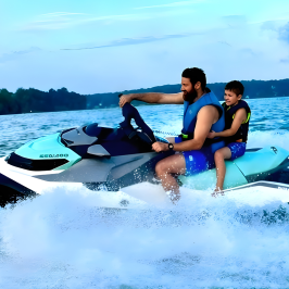Man and child riding a jetski on a lake with waves.